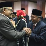 Zaini Abdullah bersama Hasanuddin Darjo (PM/Oviyandi Emnur)