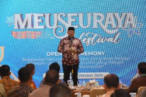 Pj Gubernur Aceh Dr, H, Safrizal, ZA, M.Si Memberi Sambutan pada Kegiatan Opening Ceremony Meuseuraya Festival di Auditorium Teuku Umar Kantor Perwakilan BI Provinsi Aceh, 18/10/2024.