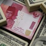 Ilustrasi - Mata uang Rupiah dan Dolar AS. Foto: Istimewa