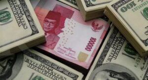 Ilustrasi - Mata uang Rupiah dan Dolar AS. Foto: Istimewa