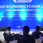 Plt. Sekda Aceh, Drs. Muhammad Diwarsyah, membuka Aceh Economic Forum (AEF) Tahun 2025 di The Pade Hotel, Kamis (16/01/2025). (Foto: MC Aceh)